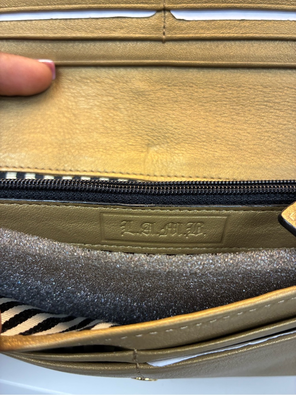 L.A.M.B Gold Embossed Leather Clutch with Black & White Stripe - Picture 5 of 8